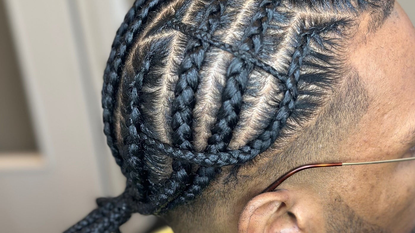 Cornrows in een gevlochten patroon, close-up van opzij